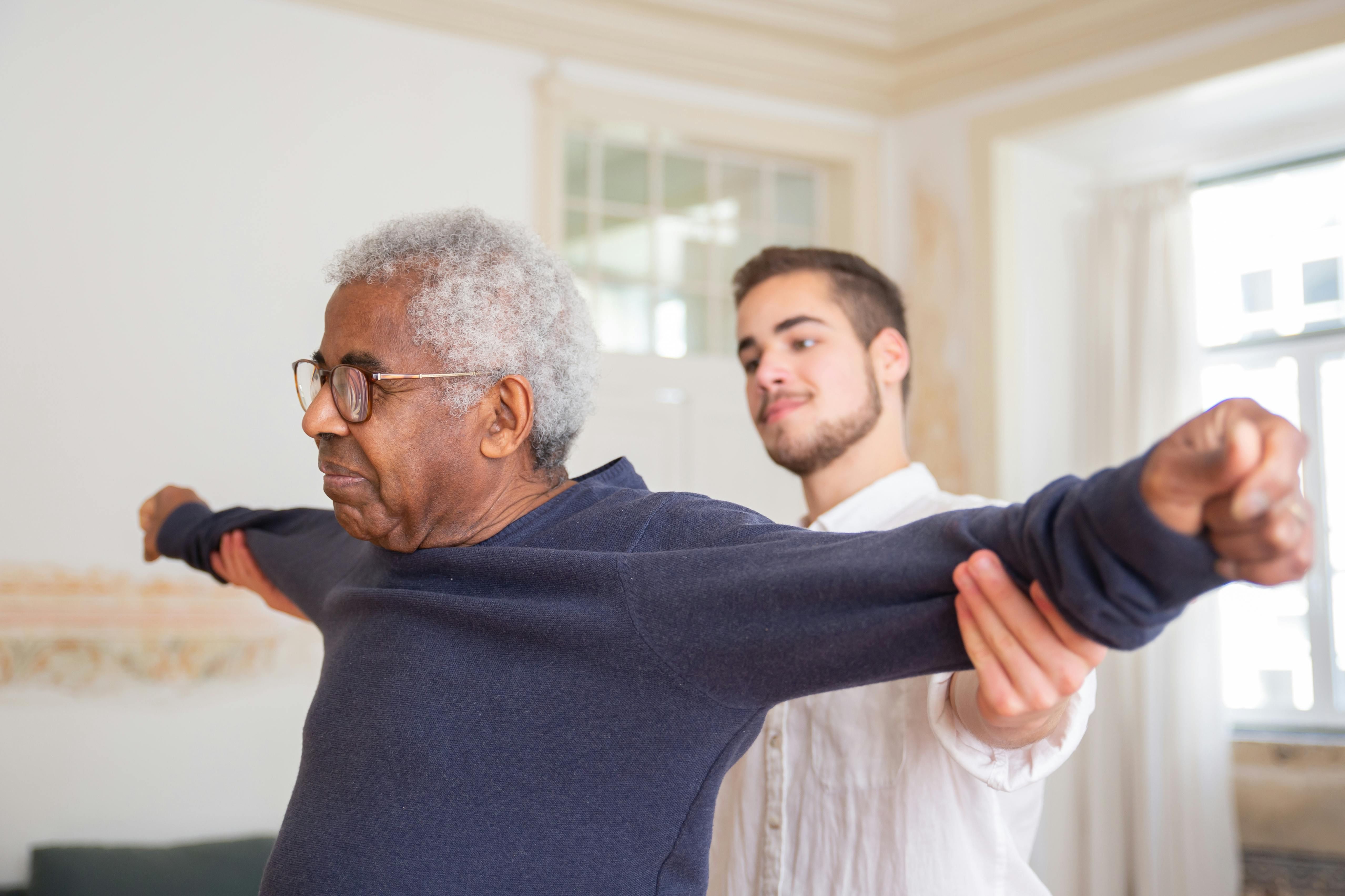Resident in physical therapy session at Landmark of Richton Park